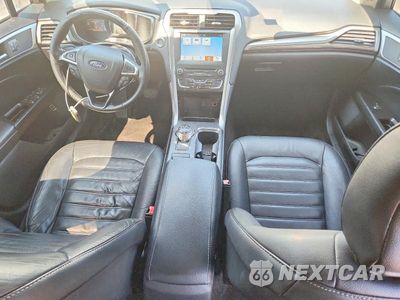 Zdjęcie 8 z 12 samochodu: 2018 FORD FUSION SE HYBRID VIN:3FA6P0LU2JR163504 - miniatura