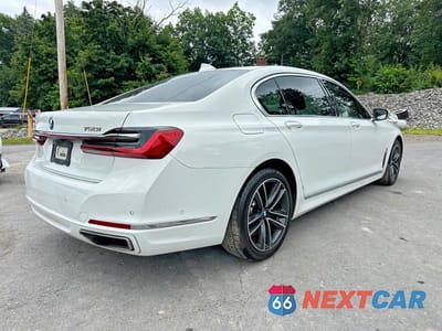 Trzecie zdjęcie samochodu z tyłu: 2021 BMW 750 XI VIN:WBA7U2C03MCG37401 - miniatura