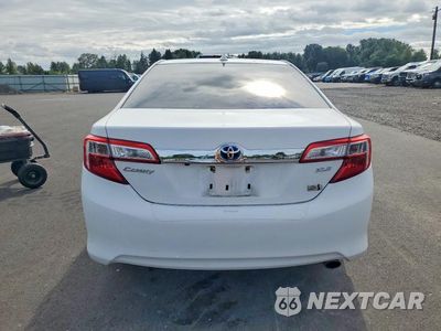 Zdjęcie 6 z 12 samochodu: 2012 TOYOTA CAMRY HYBRID XLE VIN:4T1BD1FK5CU003660 - miniatura