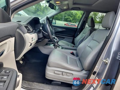 Zdjęcie 7 z 13 samochodu: 2017 HONDA PILOT EXL VIN:5FNYF5H50HB008028 - miniatura