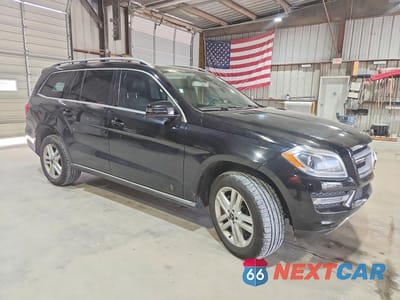 Czwarte zdjęcie samochodu z boku: 2014 MERCEDES-BENZ GL 450 4MATIC VIN:4JGDF7CE9EA389024 - miniatura