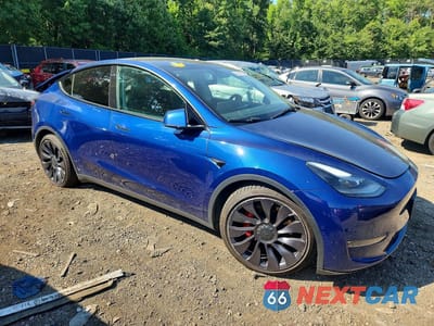 Czwarte zdjęcie samochodu z boku: 2022 TESLA MODEL Y VIN:7SAYGDEF3NF307550 - miniatura