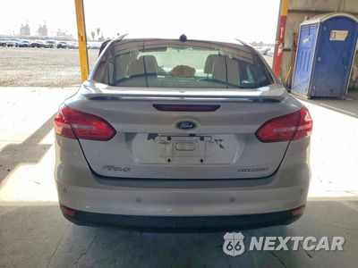 Zdjęcie 6 z 12 samochodu: 2017 FORD FOCUS TITANIUM VIN:1FADP3J20HL308509 - miniatura