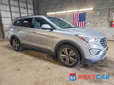 Czwarte zdjęcie samochodu z boku: 2015 HYUNDAI SANTA FE GLS VIN:KM8SR4HF6FU125015 - miniatura