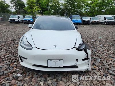 Piąte zdjęcie samochodu w środku: 2020 TESLA MODEL 3 VIN:5YJ3E1EB1LF790607 - miniatura