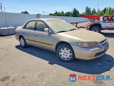Czwarte zdjęcie samochodu z boku: 2000 HONDA ACCORD LX VIN:JHMCG6657YC002979 - miniatura