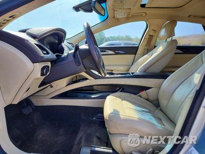 Zdjęcie 7 z 12 samochodu: 2013 LINCOLN MKZ HYBRID VIN:3LN6L2LU8DR819075 - miniatura