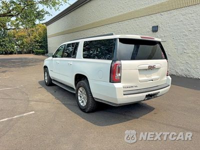 Trzecie zdjęcie samochodu z tyłu: 2019 GMC YUKON XL K1500 SLT VIN:1GKS2GKC2KR289548 - miniatura