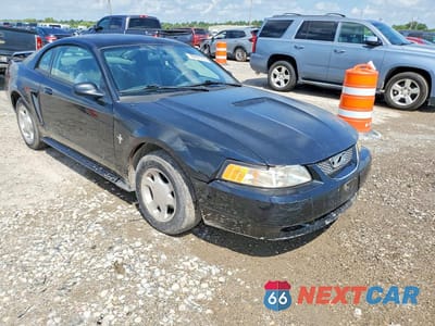 Czwarte zdjęcie samochodu z boku: 2003 FORD MUSTANG VIN:1FAFP40433F393712 - miniatura