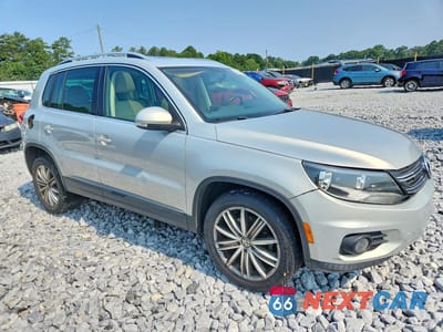 Czwarte zdjęcie samochodu z boku: 2012 VOLKSWAGEN TIGUAN S VIN:WVGAV7AX0CW536955 - miniatura