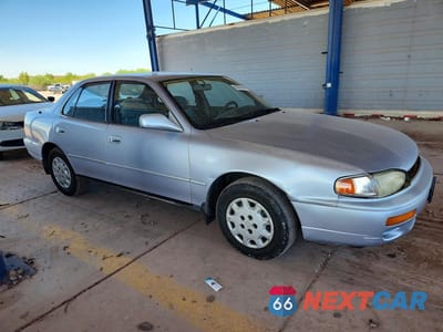 Czwarte zdjęcie samochodu z boku: 1995 TOYOTA CAMRY LE VIN:JT2SK12E6S0287969 - miniatura