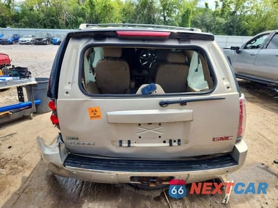 Zdjęcie 6 z 13 samochodu: 2010 GMC YUKON DENALI VIN:1GKUKEEF7AR104704 - miniatura