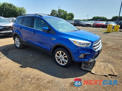 Czwarte zdjęcie samochodu z boku: 2018 FORD ESCAPE SEL VIN:1FMCU9H91JUB63402 - miniatura