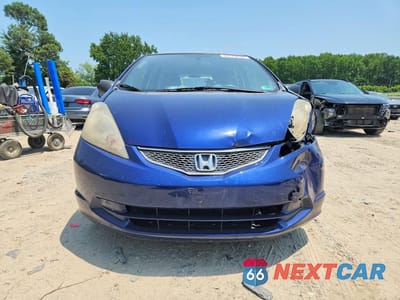 Piąte zdjęcie samochodu w środku: 2010 HONDA FIT VIN:JHMGE8H28AC015333 - miniatura