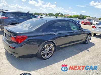 Trzecie zdjęcie samochodu z tyłu: 2013 BMW 750 LXI VIN:WBAYF8C51DD140108 - miniatura