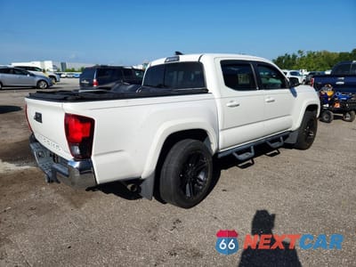 Trzecie zdjęcie samochodu z tyłu: 2018 TOYOTA TACOMA SR5 V6 VIN:3TMAZ5CN9JM075552 - miniatura