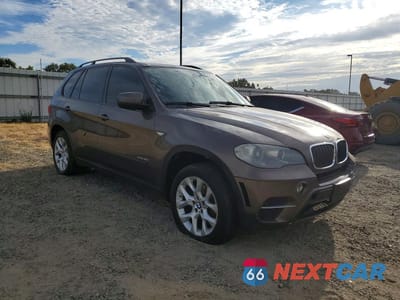 Czwarte zdjęcie samochodu z boku: 2013 BMW X5 XDRIVE35I VIN:5UXZV4C55D0B17314 - miniatura