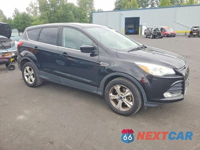 Czwarte zdjęcie samochodu z boku: 2016 FORD ESCAPE SE VIN:1FMCU9G93GUC14022 - miniatura
