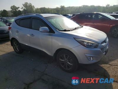 Czwarte zdjęcie samochodu z boku: 2014 HYUNDAI TUCSON SE VIN:KM8JUCAG4EU806554 - miniatura