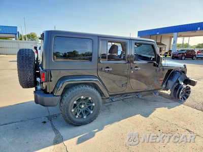 Trzecie zdjęcie samochodu z tyłu: 2014 JEEP WRANGLER UNLIMITED SAHARA VIN:1C4BJWEG3EL287015 - miniatura