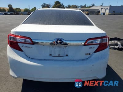 Zdjęcie 6 z 12 samochodu: 2013 TOYOTA CAMRY HYBRID XLE VIN:4T1BD1FKXDU077612 - miniatura