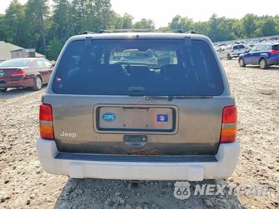 Zdjęcie 6 z 13 samochodu: 1998 JEEP GRAND CHEROKEE LAREDO VIN:1J4GZ58S1WC300252 - miniatura