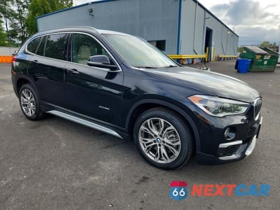 Czwarte zdjęcie samochodu z boku: 2016 BMW X1 XDRIVE28I VIN:WBXHT3Z35G4A48403 - miniatura