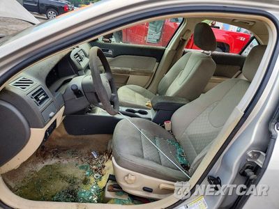 Zdjęcie 7 z 12 samochodu: 2010 FORD FUSION SE VIN:3FAHP0HA5AR405564 - miniatura