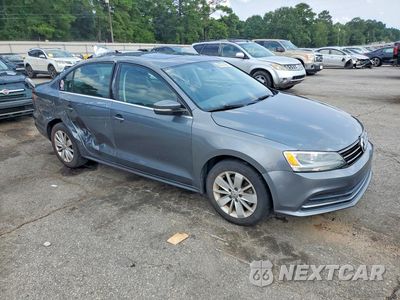Czwarte zdjęcie samochodu z boku: 2016 VOLKSWAGEN JETTA SE VIN:3VWD67AJ7GM300204 - miniatura
