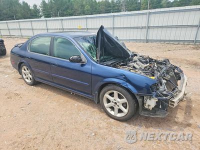 Czwarte zdjęcie samochodu z boku: 2003 NISSAN MAXIMA GXE VIN:JN1DA31DX3T509231 - miniatura