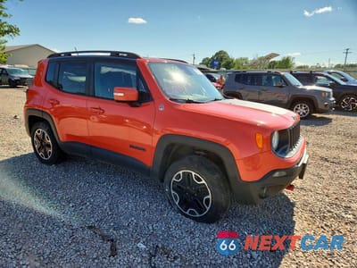 Czwarte zdjęcie samochodu z boku: 2016 JEEP RENEGADE TRAILHAWK VIN:ZACCJBCT3GPD55311 - miniatura
