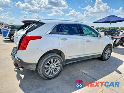 Trzecie zdjęcie samochodu z tyłu: 2017 CADILLAC XT5 VIN:1GYKNARS9HZ104878 - miniatura
