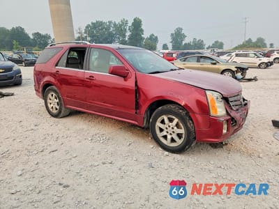 Czwarte zdjęcie samochodu z boku: 2004 CADILLAC SRX VIN:1GYEE637040159863 - miniatura