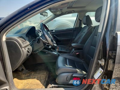 Zdjęcie 7 z 12 samochodu: 2010 VOLKSWAGEN JETTA WOLFSBURG VIN:3VWRJ7AJ6AM037831 - miniatura