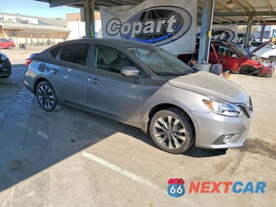 Czwarte zdjęcie samochodu z boku: 2019 NISSAN SENTRA S VIN:3N1AB7AP7KY426590 - miniatura