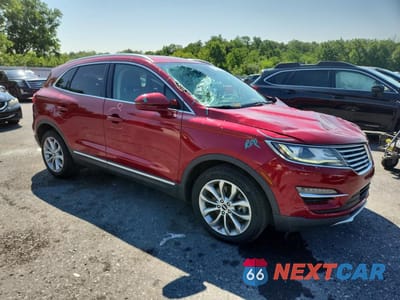 Czwarte zdjęcie samochodu z boku: 2018 LINCOLN MKC SELECT VIN:5LMCJ2D92JUL15190 - miniatura