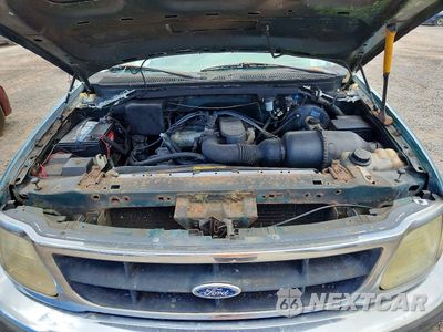 Zdjęcie 11 z 12 samochodu: 1998 FORD F150 VIN:1FTZF1724WKC08348 - miniatura