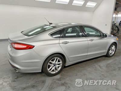 Trzecie zdjęcie samochodu z tyłu: 2016 FORD FUSION SE VIN:3FA6P0HD5GR260407 - miniatura