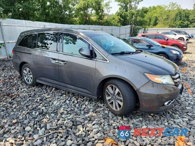 Czwarte zdjęcie samochodu z boku: 2014 HONDA ODYSSEY TOURING/TOURING ELITE VIN:5FNRL5H99EB111640 - miniatura