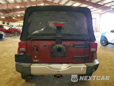 Zdjęcie 6 z 13 samochodu: 2010 JEEP WRANGLER UNLIMITED SAHARA VIN:1J4BA5H12AL114415 - miniatura