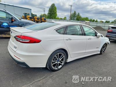 Trzecie zdjęcie samochodu z tyłu: 2019 FORD FUSION TITANIUM VIN:3FA6P0RU9KR262670 - miniatura