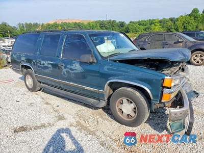 Czwarte zdjęcie samochodu z boku: 1997 CHEVROLET SUBURBAN C1500 VIN:1GNEC16R1VJ317335 - miniatura