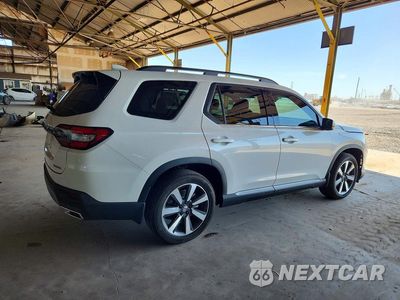 Trzecie zdjęcie samochodu z tyłu: 2025 HONDA PILOT TOURING VIN:5FNYG1H79SB167077 - miniatura