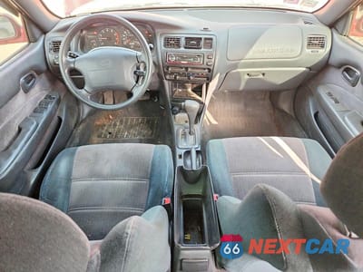 Zdjęcie 8 z 13 samochodu: 1995 TOYOTA COROLLA LE VIN:1NXAE00B4SZ266197 - miniatura