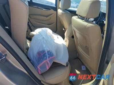 Zdjęcie 10 z 12 samochodu: 2013 BMW X1 XDRIVE28I VIN:WBAVL1C57DVR91228 - miniatura