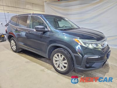 Czwarte zdjęcie samochodu z boku: 2019 HONDA PILOT LX VIN:5FNYF6H10KB056445 - miniatura