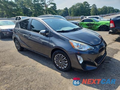 Czwarte zdjęcie samochodu z boku: 2016 TOYOTA PRIUS C TWO VIN:JTDKDTB34G1138229 - miniatura