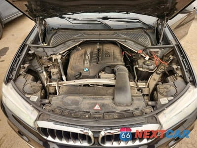 Zdjęcie 11 z 12 samochodu: 2015 BMW X5 XDRIVE35I VIN:5UXKR0C5XF0K59642 - miniatura