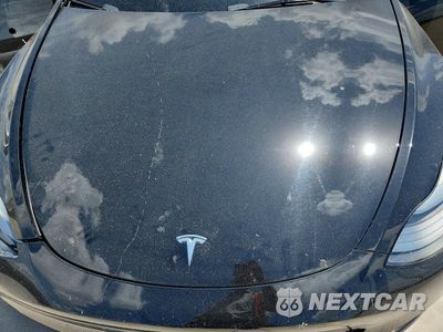 Zdjęcie 12 z 13 samochodu: 2023 TESLA MODEL Y VIN:7SAYGAEE8PF832113 - miniatura