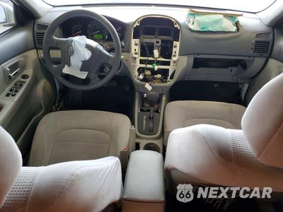 Zdjęcie 8 z 13 samochodu: 2009 KIA SPECTRA LX VIN:KNAFE221X95662436 - miniatura
